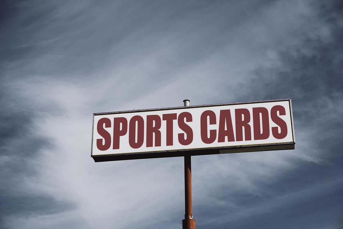  Large Sports Cards road sign with blue sky in the background.