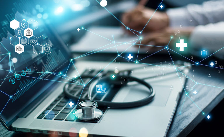 Laptop with stethescope laying on top with a superimposed image of technology connectivity.