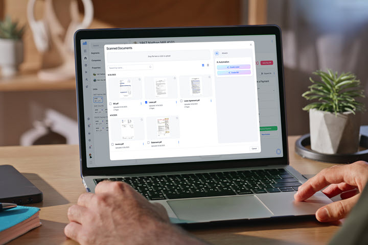 Property Matrix software displayed on laptop screen. 